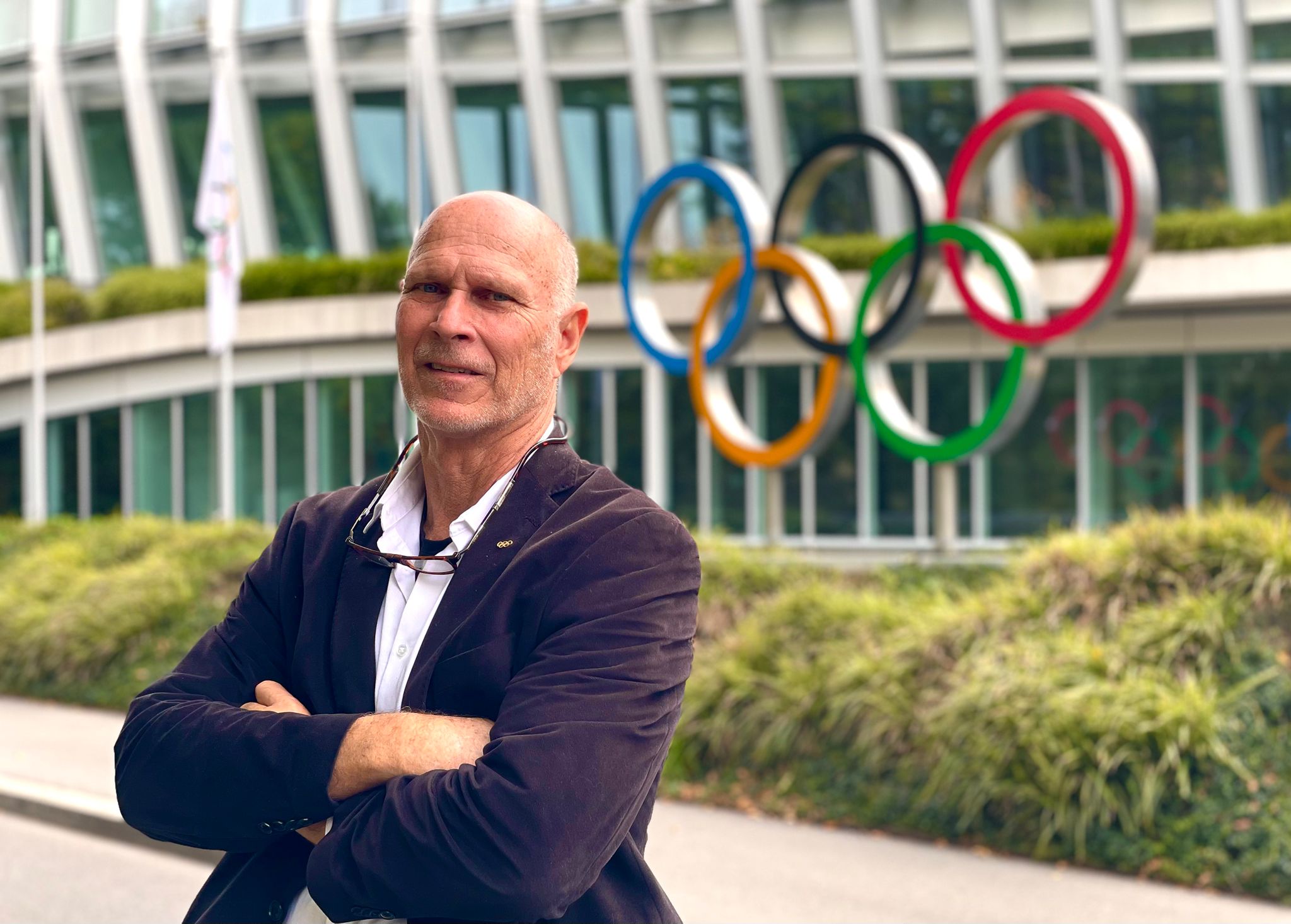 Liston Bochette and The Olympic Rings in front of the IOC