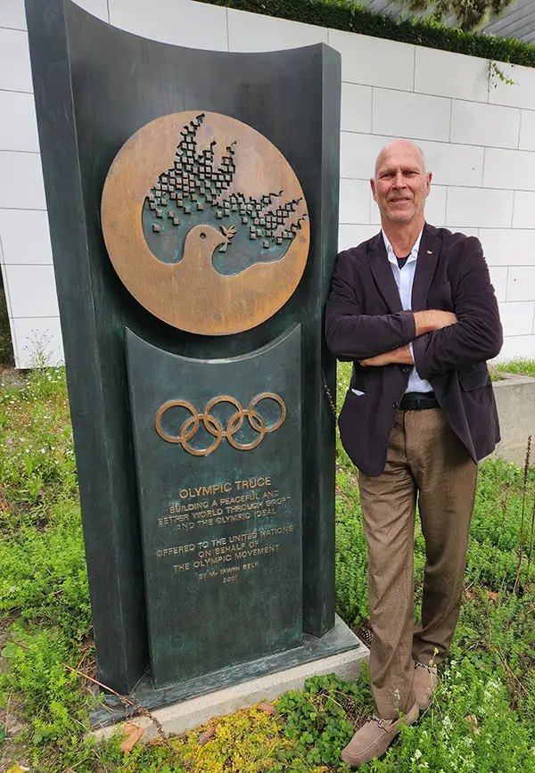 Liston Bochette - The Olympic Rings in front of the IOC Olympic Torch